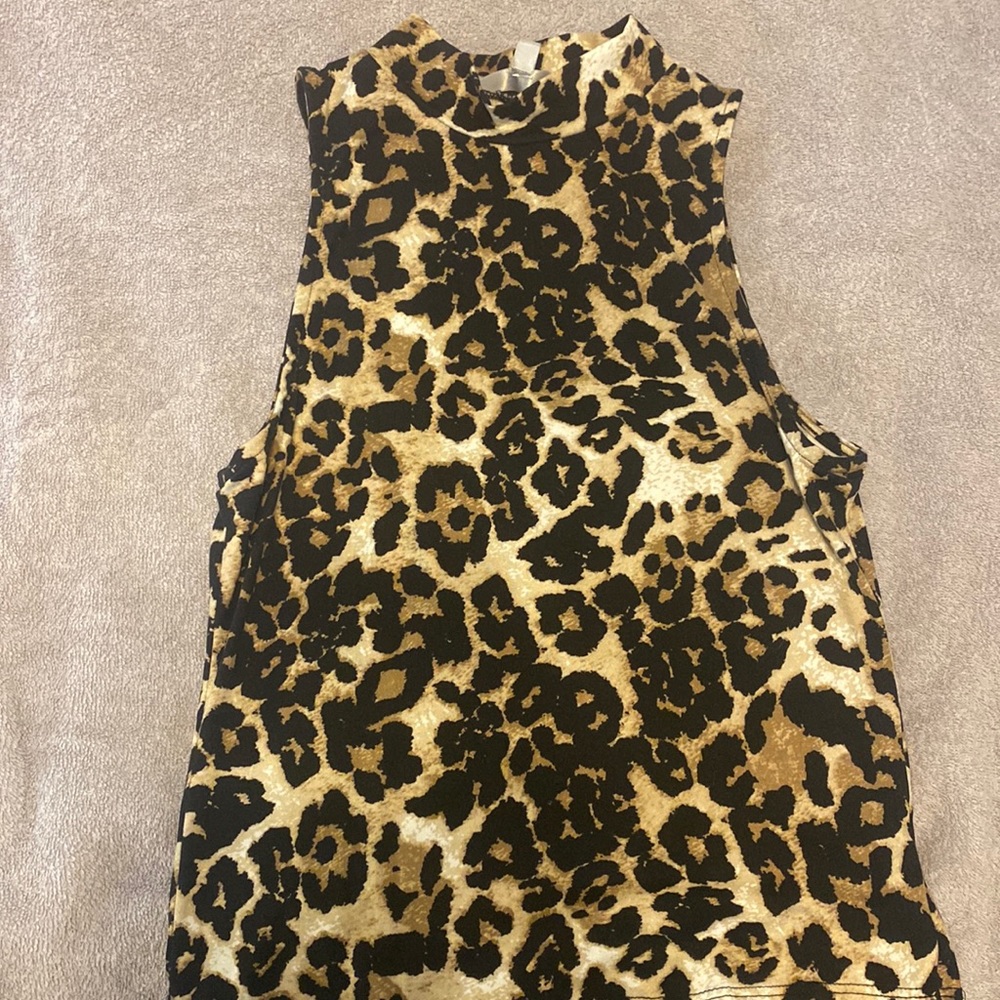 Cheetah print sleeveless turtle neck top